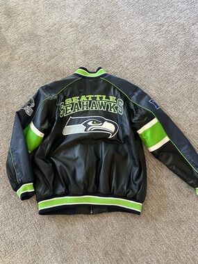 NFL Quilted Black Jacket with Red and Blue Shield Patch